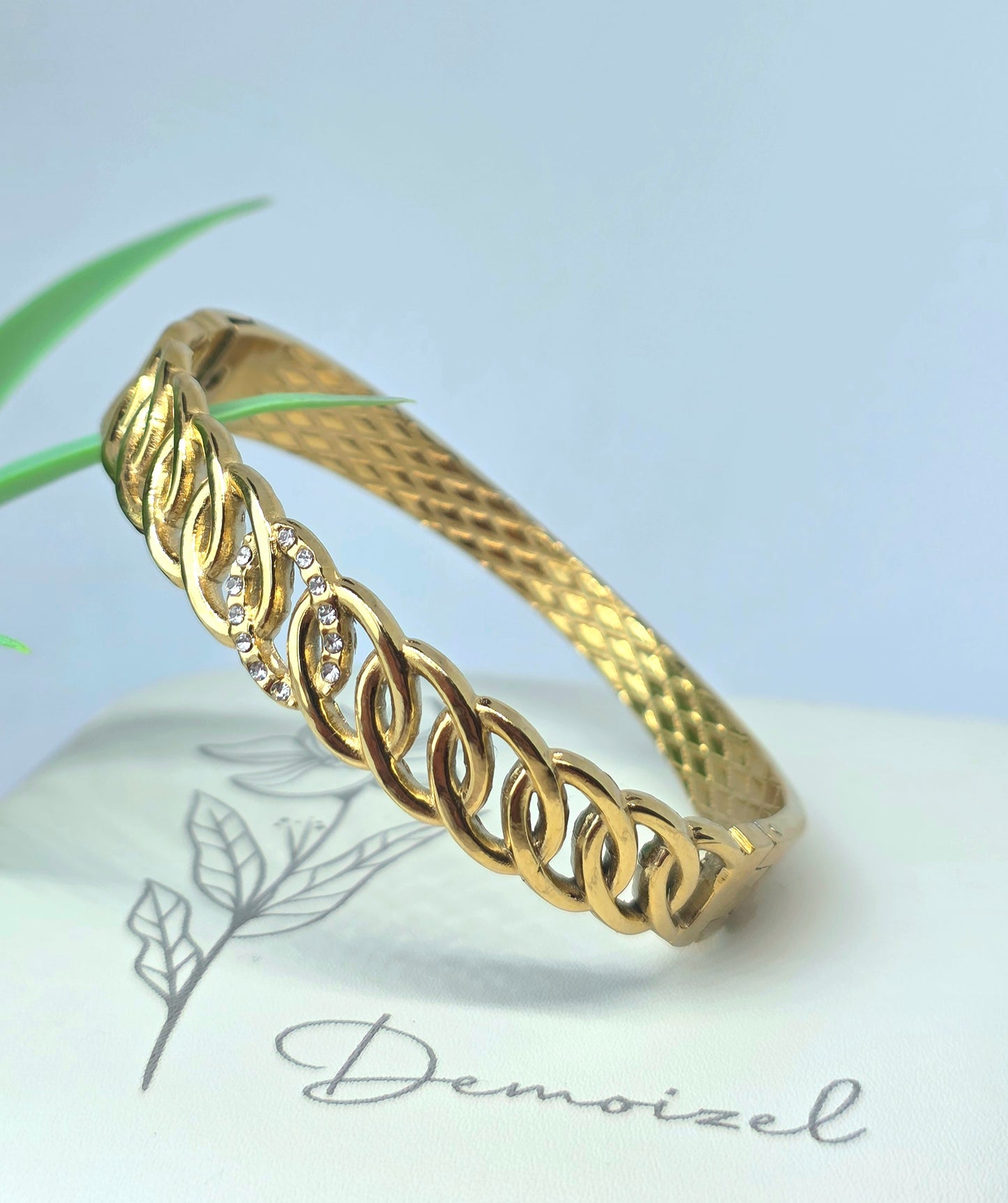Elegant Gold-Tone Braided Bracelet with Sparkling Rhinestones