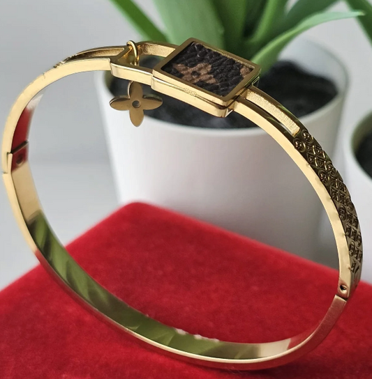 Gold Textured Cuff Bracelet with Lock Clasp