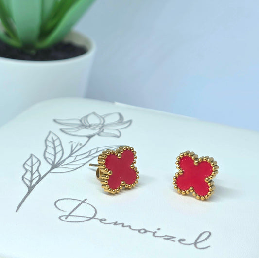 Gold Clover Earrings with Red Accent