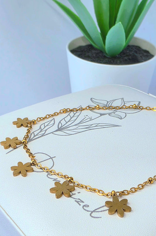Bracelet de cheville à fleurs dorées